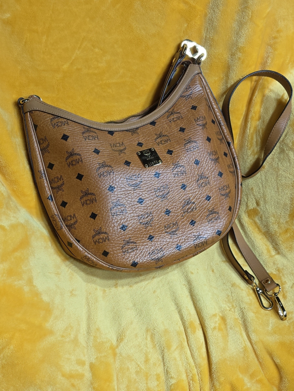 Authentic MCM Cognac Visetos Crescent Crossbody Bag